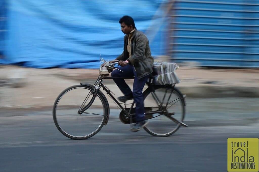 Newspaper Delivery Man