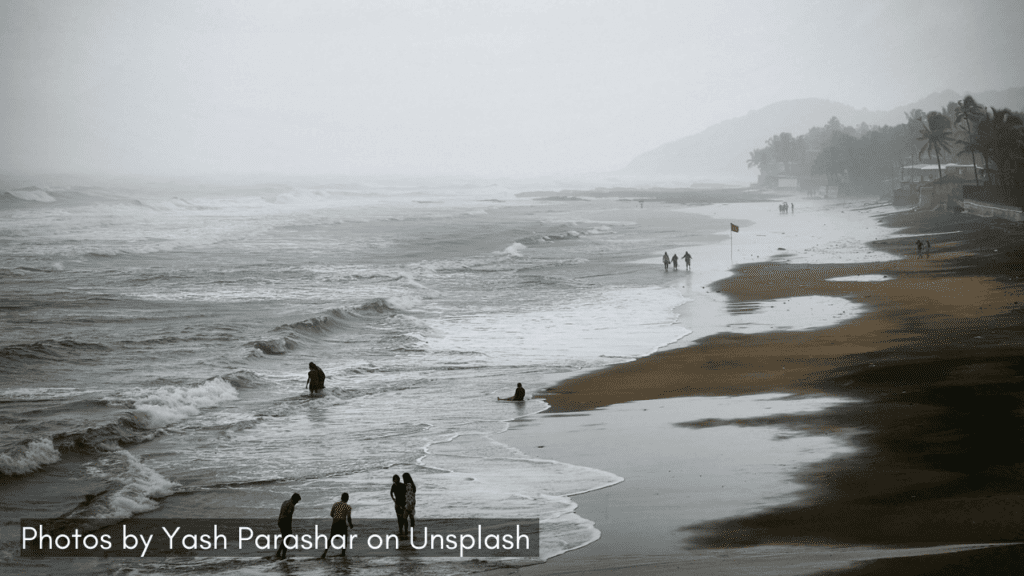 A view of the misty Anjuna Beach one of the places to visit in Goa in monsoon.