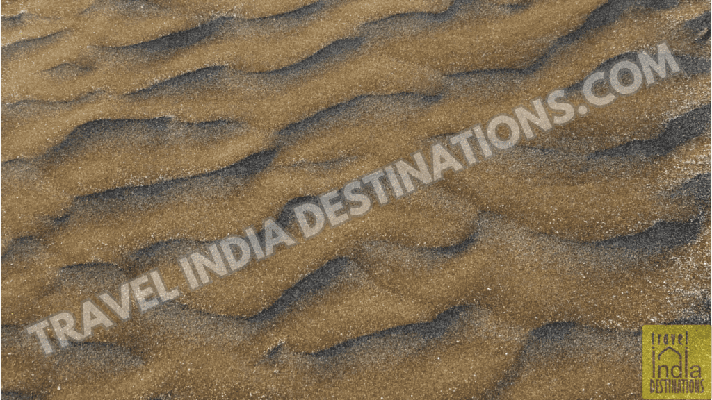 The blackish sand of Suruchi Beach is quite different from regular Mumbai beaches.