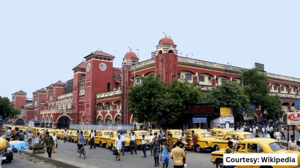 An exterior shot of Howrah Junction in West Bengal, historic railway station with original 1854 structure, one of India’s busiest stations.