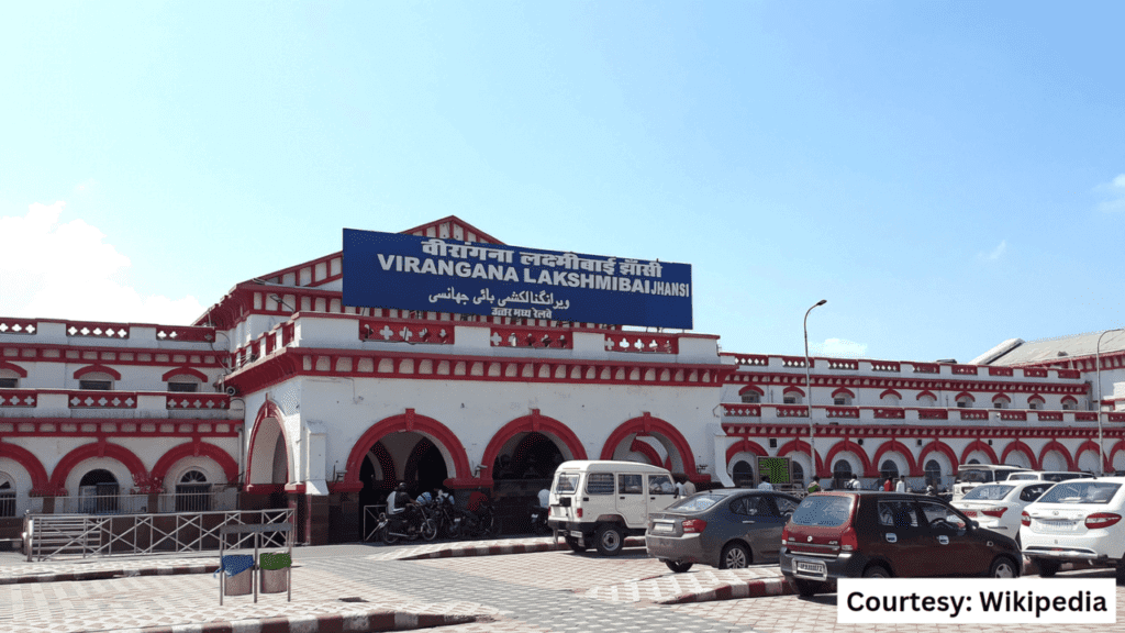 An exterior shot of Jhansi Junction, historic railway station built in 1881, known for its fort-like architecture and long platforms.