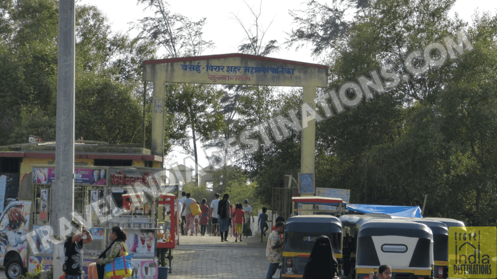 The main entrance of Suruchi Beach in Vasai West with auto rickshaws for hire and food stalls.
