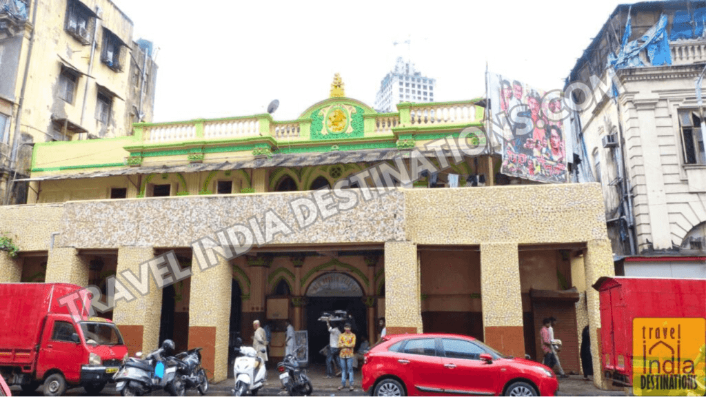 Exterior shot of the New Roshan Talkies in Mumbai now playing regional language movies.