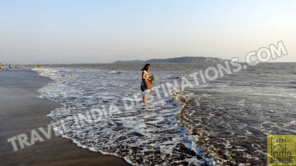 A woman having fun at Suruchi Beach in Vasai