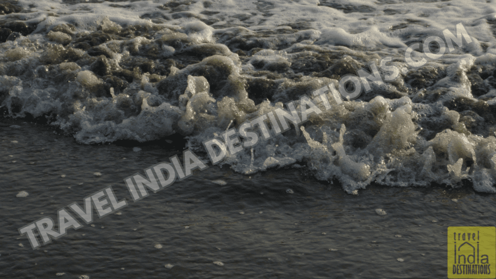A closeup shot of the waves at Vasai's Suruchi Beach