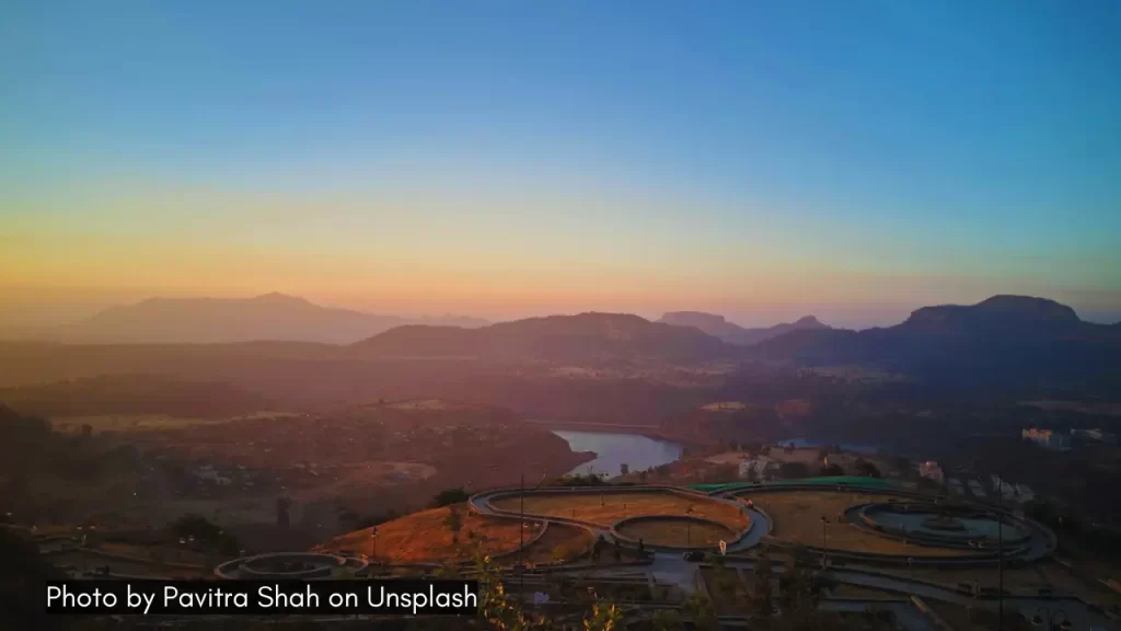 Sunset over Saputara Lake and the adjoining hills, one of the best places to visit in India in September.