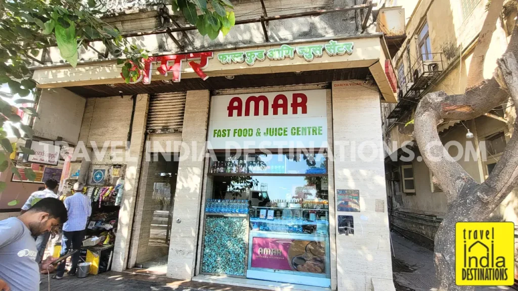 Exterior shot of Amar Fast Food and Juice Center at Girgaon Chowpatty, one of the best spots for juices in Mumbai.