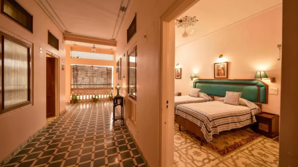 A shot of the corridor and Superior Double Room at Hotel Arya Niwas one of the budget heritage hotels in Jaipur.