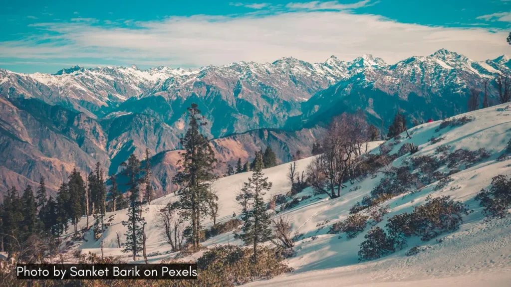 A dreamy snowy landscape of Auli ideal for adventurers and honeymooners in India.