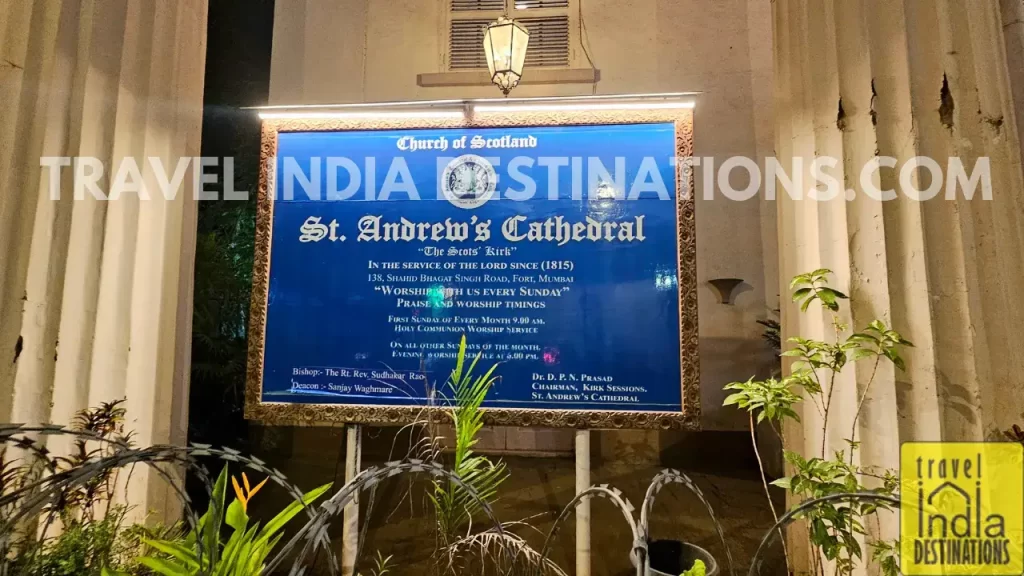 A notice board outside St. Andrew's Cathedral also known as Church of St. Andrew with worship timings and other details.