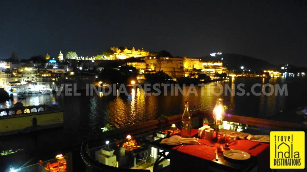 A shot of the City Palace Udaipur from the deck table at Upre by 1559 AD.