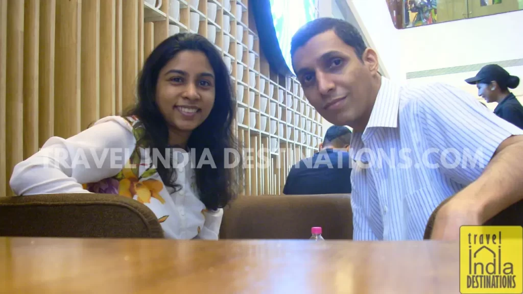 a couple having a good time at Starbucks Mumbai because of better honeymoon planning tips 