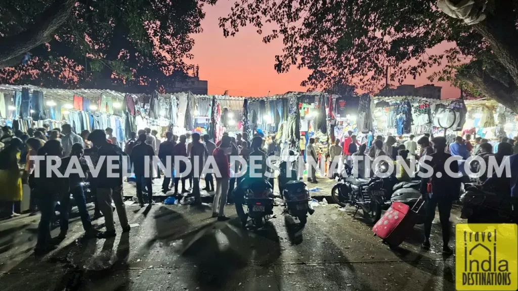 A shot of Fashion Street with people buying clothes during evening hours one of the best Mumbai shopping places. 