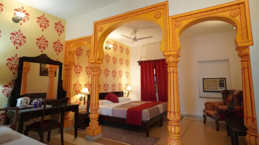Interiors of the Superior King Room at Haveli Kalwara, one of the budget heritage hotels in Jaipur.