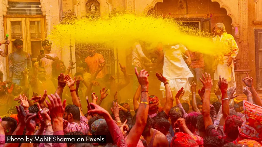 People celebrating Holi in Udaipur in Rajasthan in India.