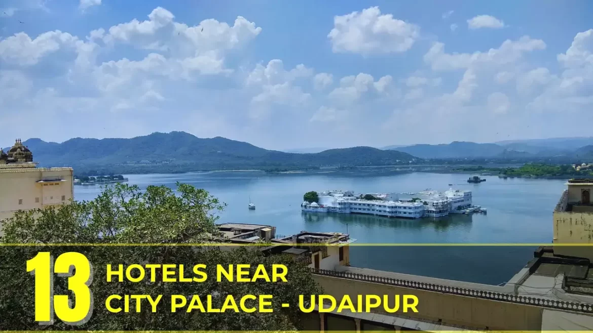 Lake Pichola view from Udaipur’s City Palace with hills and the Taj Lake Palace in the distance.