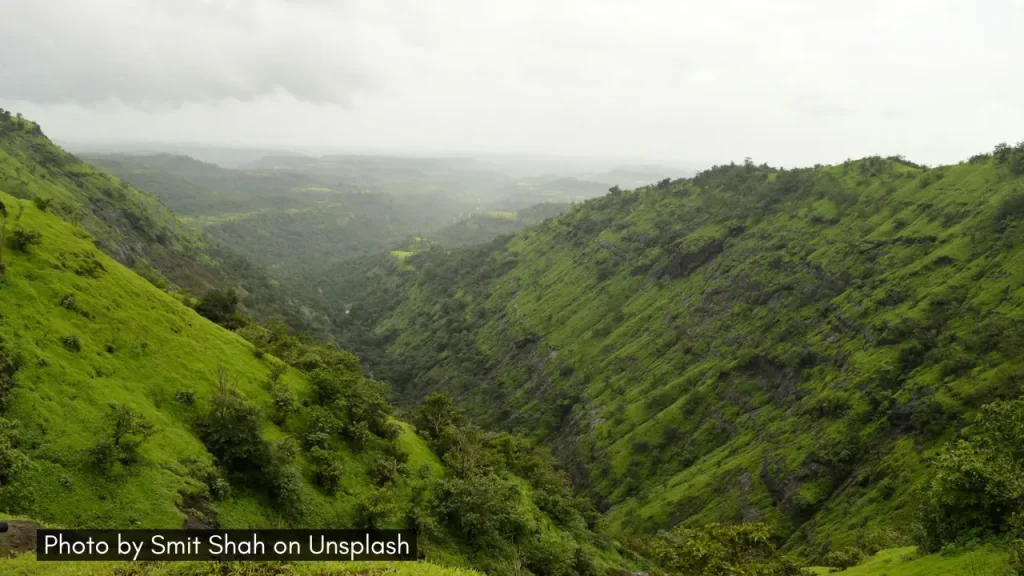 A scenic shot of lush green valley in Igatpuri in Maharashtra one of the best places to visit in monsoon.
