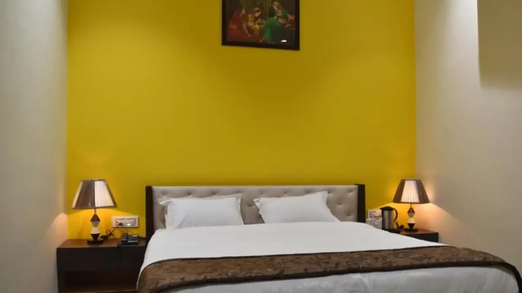 A clean and comfortable room at Jaipur Hotel New - Heritage Hotel, one of the budget havelis near Johari Bazar.