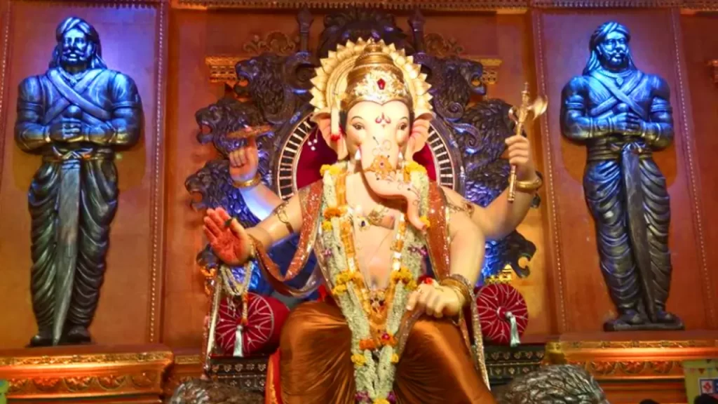 Towering Ganesh idol at Khetwadi 12th Lane Pandal with detailed ornamentation and bright colors one of the tallest ganpati idols in Mumbai