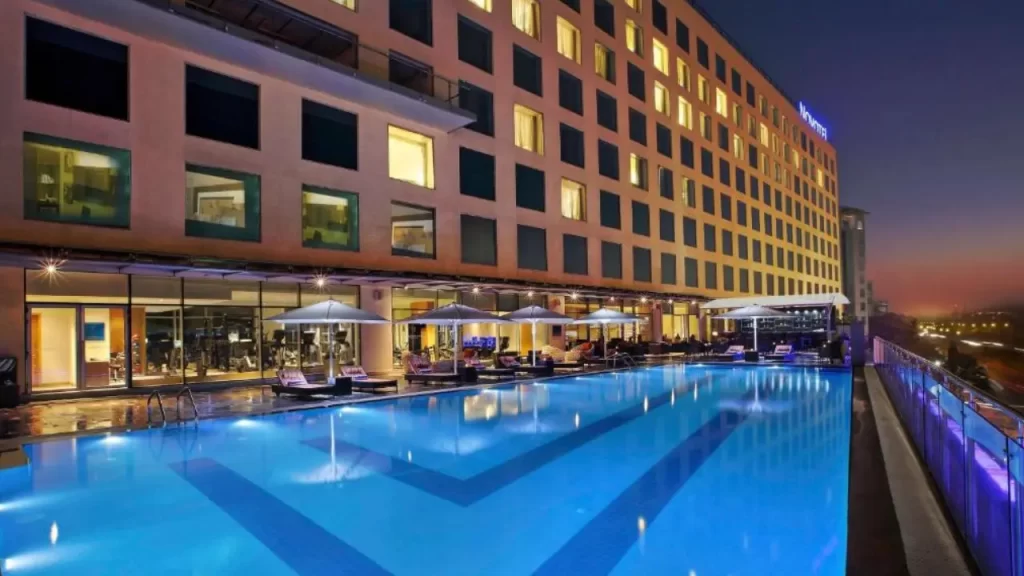 Novotel Pune Viman Nagar with rooftop pool at evening