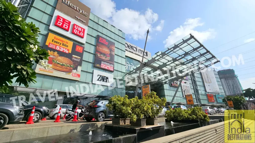 Modern industrial-style exterior of Oberoi Mall Goregaon with clean lines and glass façade