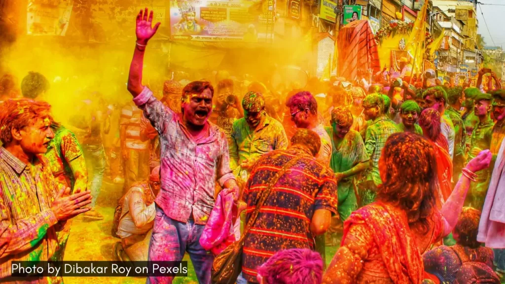 people dancing on Holi festival in India