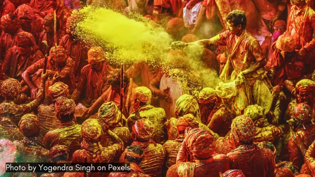 people throwing colours on Holi in India