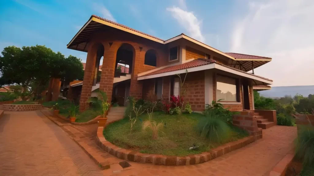 Burnt-brick color resort building of Riverside County Resort Amba Ghat
