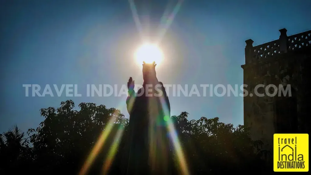A shot of the evening sun against the Christ The King statue at St Andrew's Church Bandra