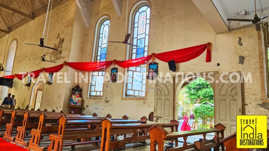 A picture of the north-side wall with stained glass windows at St Andrew's Church Bandra.