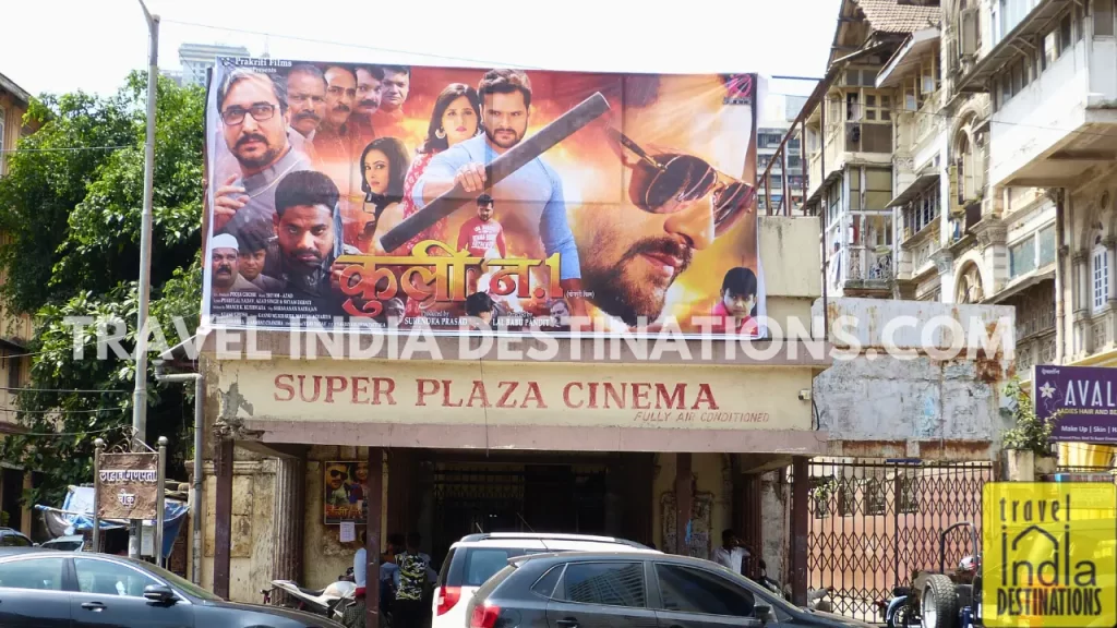 Exterior shot of Super Plaza Cinema in Grant Road Mumbai with a poster of a regional movie.