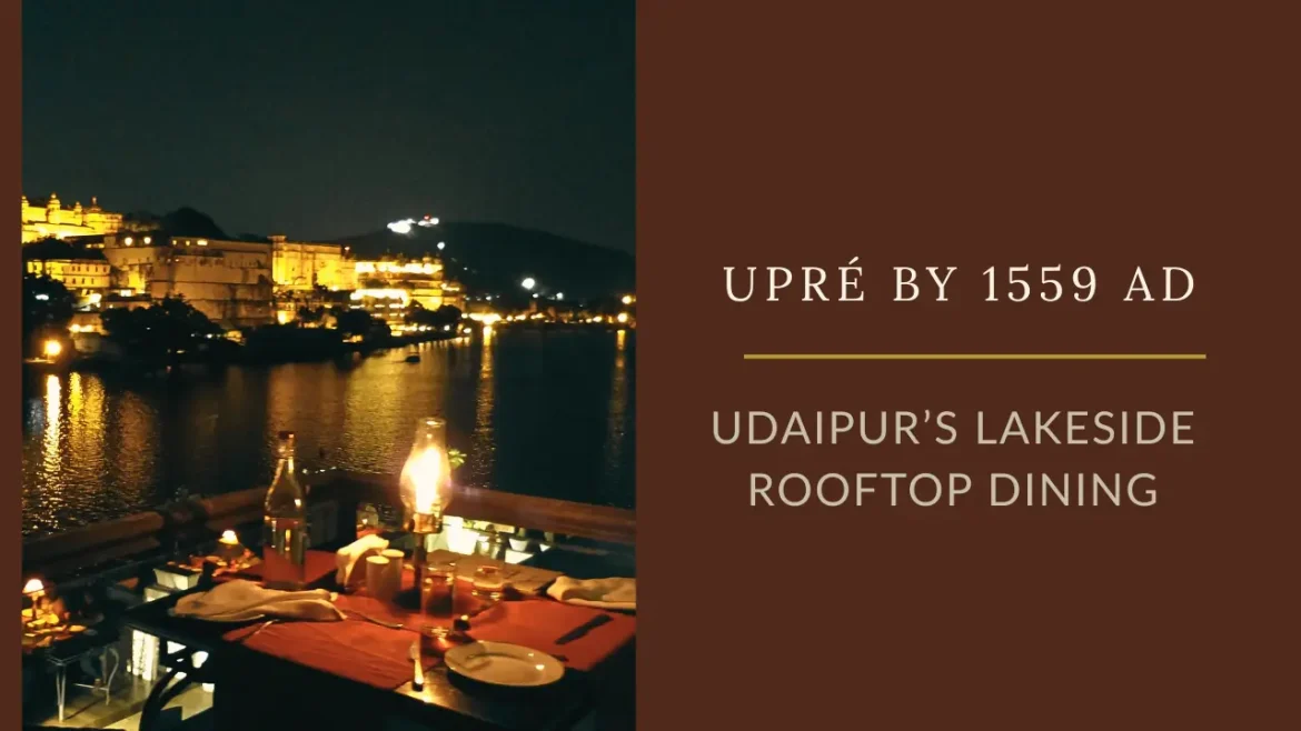 A night shot of a dinner table at Upre by 1559 AD along with City Palace Udaipur in the background.