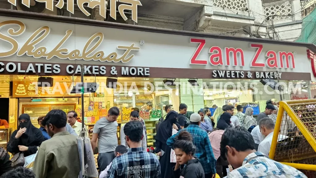 The front view of Zam Zam Sweets & Bakery selling sweets and savory food items during iftar hours in Ramadan.
